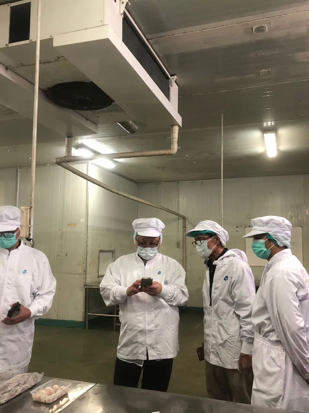 Buyer visit and facility audit inside the cold storage room